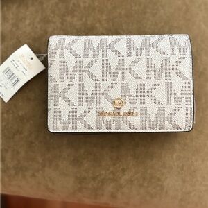 Michael Kors Cream wallet with Logo Pattern
